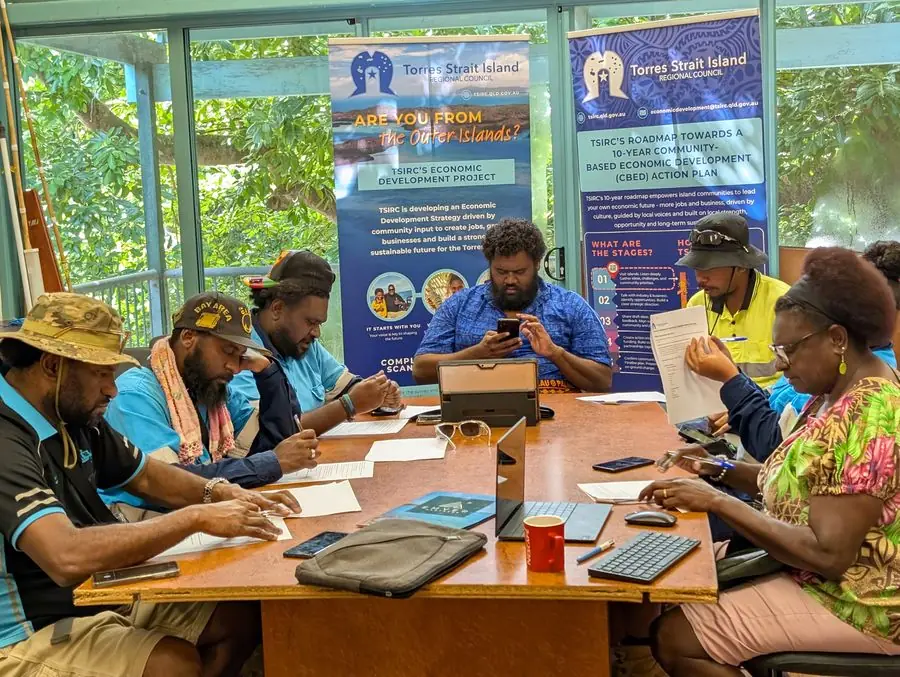 Planning session around a table in a Torres Strait community office